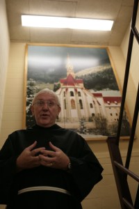 Father Richard who works for the Franciscan University in Steubenville, Ohio, in front of a picture of the Kartause Gaming
